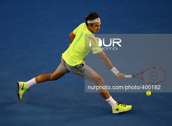 MELBOURNE, Jan. 19, 2015 () -- Roger Federer of Switzerland returns the ball during the first round match of men's singles with Lu Yen-Hsun...