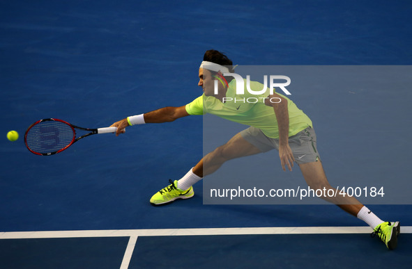 (150119) -- MELBOURNE, Jan. 19, 2015 () -- Roger Federer of Switzerland returns the ball during the first round match of men's singles with...