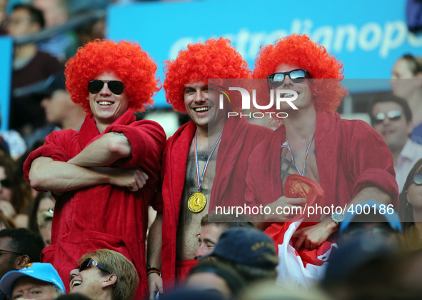 (150119) -- MELBOURNE, Jan. 19, 2015 () -- Fans of Roger Federer cheer for him during the first round match of men's singles between Switzer...