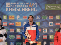(L-R) Mikael Kingsbury (CAN), Anthony Benna (FRA) and Alexandr Smyshlyaev (RUS) receive their medals in Men's Moguls final at the FIS Freest...