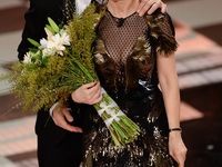 Luciana Littizzetto and Fabio Fazio attend closing night of the 64rd Sanremo Song Festival at the Ariston Theatre on February 22, 2014 in Sa...