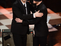 Fabio Fazio and The Bloody Beetroots attend closing night of the 64rd Sanremo Song Festival at the Ariston Theatre on February 22, 2014 in S...