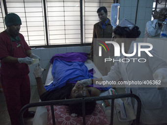 A victims of a recent bomb attack in a bus, receives treatment at Dhaka Medical College Hospital (DMCH) during the ongoing nationwide blocka...