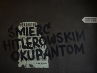 A mural 'Smierc Hitlerowskim Okupantom' ( A Death of Nazi occupiers) inside the Auschwitz Muzeum. Oświęcim, Poland. 26 January 2015. Picture...