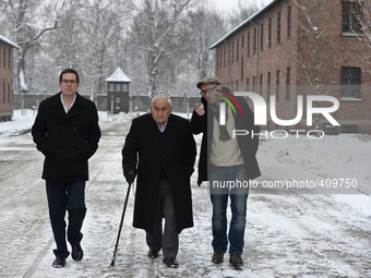 Auschwitz survivor, Mathias Hirsch (Center), accompanied by his two sons, Mathias (Left) and Michael (Right) from Switzerland, returns to Au...