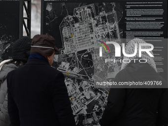 A group of tourists look at the plan of Auschwitz I. Oświęcim, Poland. 26 January 2015. Picture by: Artur Widak/NurPhoto (