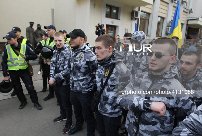 National Corps activists, the Ukrainian far-right party, attend their anti-corruption rally near the Ministry of Internal affairs in Kiev, U...
