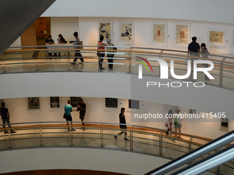 A general view inside Bangkok Art and Culture Centre as tourists enjoys the painting exhibition in Bangkok, Thailand on January 31, 2015. Th...