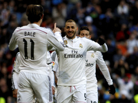 Real Madrid's French forward Karim Benzema Celebrates a goal during the Spanish League 2014/15 match between Real Madrid and Real Sociedad,...