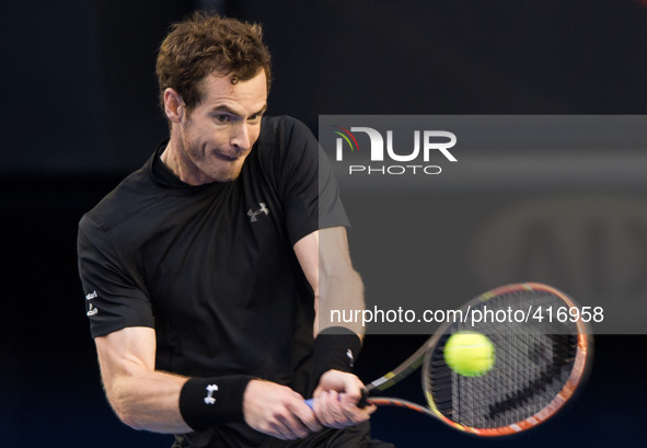 MELBOURNE, Feb. 1, 2015 () -- Andy Murray of Great Britain returns the ball during his men's singles final match against Novak Djokovic of S...