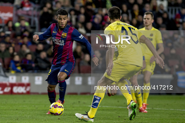 Barcelona, Catalonia, Spain. Fabruary 1, 2015 Rafinha of Barcelona and VIctor Ruiz of Villarreal in action during the spanish league match b...