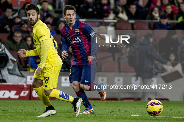Barcelona, Catalonia, Spain. Fabruary 1, 2015 Leo Messi of Barcelona and Costa of Villarreal in action during the spanish league match betwe...