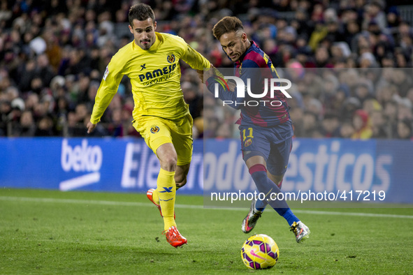 Barcelona, Catalonia, Spain. Fabruary 1, 2015 Neymar Jr of Barcelona and Bruno of Villarreal in action during the spanish league match betwe...