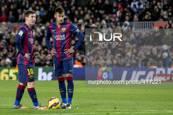 Barcelona, Catalonia, Spain. Fabruary 1, 2015 Leo Messi and Neymar Jr of Barcelona and **** of Villarreal in action during the spanish leagu...