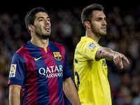 Barcelona, Catalonia, Spain. Fabruary 1, 2015 Luis Suarez of Barcelona and Victor Ruiz of Villarreal in action during the spanish league mat...
