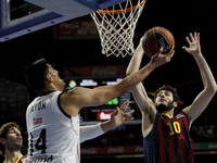 Real Madrid's Mexican player Gustavo Ayon and Barcelona´s Spanish player Alex Abrinesduring the Basket Euroleague 2014/15 match between Real...