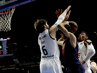 Real Madrid's Argentine player Andres Nocion and Barcelona´s Spanish player Alex Abrines during the Basket Euroleague 2014/15 match between...