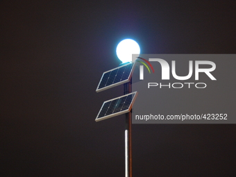 A solar powered street lamp, on Thursday 5th February 2015, illuminating the night in Manchester, England. -- A street light using solar ene...
