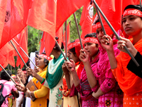 Bangladeshi garment workers and other labor organization activists take part in a rally to mark May Day or International Workers' Day in Dha...