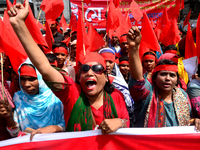 Bangladeshi garment workers and other labor organization activists take part in a rally to mark May Day or International Workers' Day in Dha...