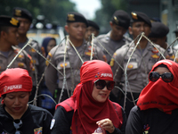 Thousand of labours from various labour organizations commemorating the International Labour Day or knows as May Day in Jakarta on May 1, 20...