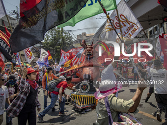 Protesters take part in Labor Day demonstrations outside the presidential palace on May 1, 2019 in Manila, Philippines. Thousands of Filipin...