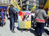 Supporters of Imam Sis members attend May Day March And Rally In Cardiff, Wales, on 1st May 2019.  (