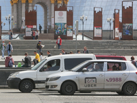 UBER taxi service vehicle drives through the Khreshchatyk street in Kyiv, Ukraine, May 7, 2019. New York Taxi Workers Alliance informs that...