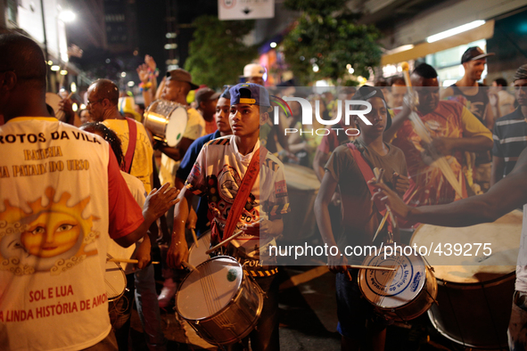 Kids play drums on Carnival parade in Augusta Street in Sao Paulo, Brazil on February 13, 2015. It is estimated that millions of people will...