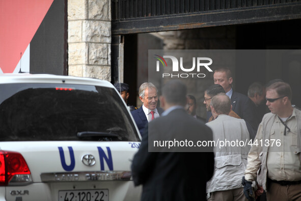 Middle East Quartet envoy Tony Blair (C) leaves after a meeting with Palestinian unity government ministers in Gaza city on February 15, 201...