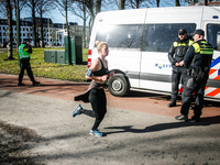 A runner with bare arms is seen on 18th February 2015 in The Hague, Netherlands. Temperatures this winter have been significantly above the...