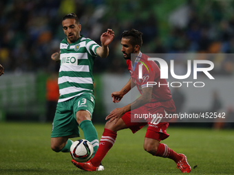 Sporting's defender Miguel Lopes (L) vies for the ball with Gil Vicente's defender Ruben Ribeiro (R)  during the Portuguese League  football...