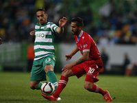 Sporting's defender Miguel Lopes (L) vies for the ball with Gil Vicente's defender Ruben Ribeiro (R)  during the Portuguese League  football...