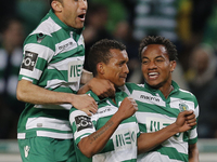 Sporting's midfielder Nani  (C)  celebrates his goal with Sporting's defender Jefferson (L) and Sporting's forward Andre Carrillo (R)  durin...