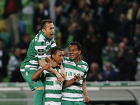 Sporting's midfielder Nani  (C)  celebrates his goal with Sporting's defender Jefferson (L) and Sporting's forward Andre Carrillo (R)  durin...