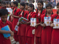 People from different community distributed free story book to slum children of a school on the occasion of Ekushe Book Fair on February 24,...