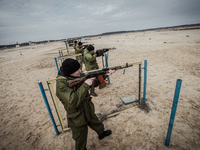 Cadets shooting from Kalashnikov guns during firing training with SPG recoilless guns and Kalashnikov guns at the 169th Training center of U...