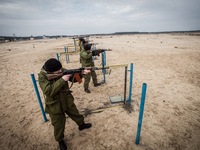 Cadets shooting from Kalashnikov guns during firing training with SPG recoilless guns and Kalashnikov guns at the 169th Training center of U...