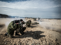 Cadets shoot a SPG recoilless gun during firing training with SPG recoilless guns and Kalashnikov guns at the 169th Training center of Ukrai...