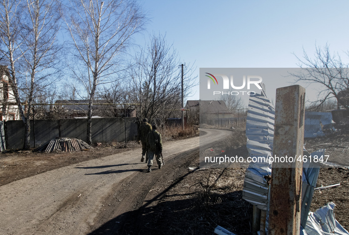 Soldiers of OUN battalion patrol the Pisky village next ot Donetsk airport (Photo by Sergii Kharchenko/NurPhoto)