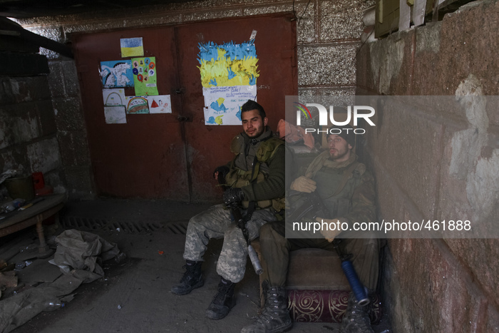 Soldiers of OUN battalion have a rest during the lull in fighting against pro-russian terrorists at Donbas (Photo by Sergii Kharchenko/NurPh...