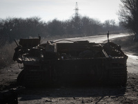 Knocked-out ukrainian army main battle tank is seeing on the lonesome road near the Pisky village not far from Donetsk airport (Photo by Ser...