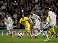Real Madrid's Portuguese forward Cristiano Ronaldo scores a goal during the Spanish League 2014/15 match between Real Madrid and Villarreal...