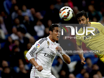 Real Madrid's Portuguese forward Cristiano Ronaldo and Villarreal CF´s Spanish Defender player Jaume Costa  during the Spanish League 2014/1...