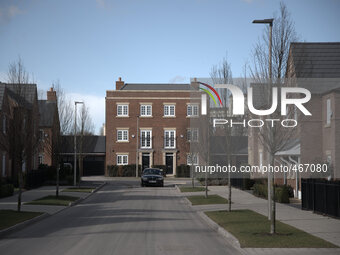 Light shining on the newly completed road in a new housing estate in Northwich, Cheshire, England, on Tuesday 3rd March 2015. -- A new housi...