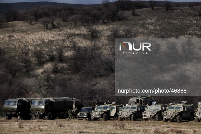 Alleged Russian military vehicles parked next to the besieged Ukrainian Military Base in Perevalnoye near Simferopol, Crimea (Ukraine) on Ma...