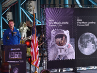 NASA astronaut Stanley Love speaks during the dedication ceremony for two new commemorative 1969: First Moon Landing Forever stamps issued b...