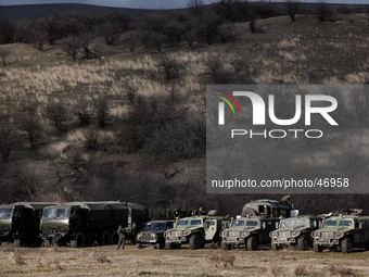 Alleged Russian military vehicles parked next to the besieged Ukrainian Military Base in Perevalnoye near Simferopol, Crimea (Ukraine) on Ma...