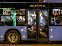 Hundreds of migrants depart in buses from Budapest Keleti railway station in Budapest, Hungary, September 5, 2015. A record number of refuge...