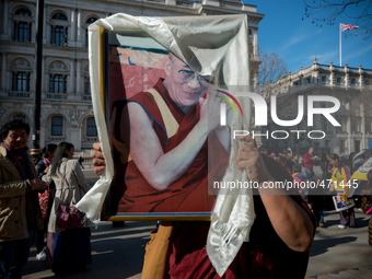 March in solidarity with Tibet against Chinese occupation attracted hundreds people in London, on March 7, 2015. Chinese authorities occupyi...